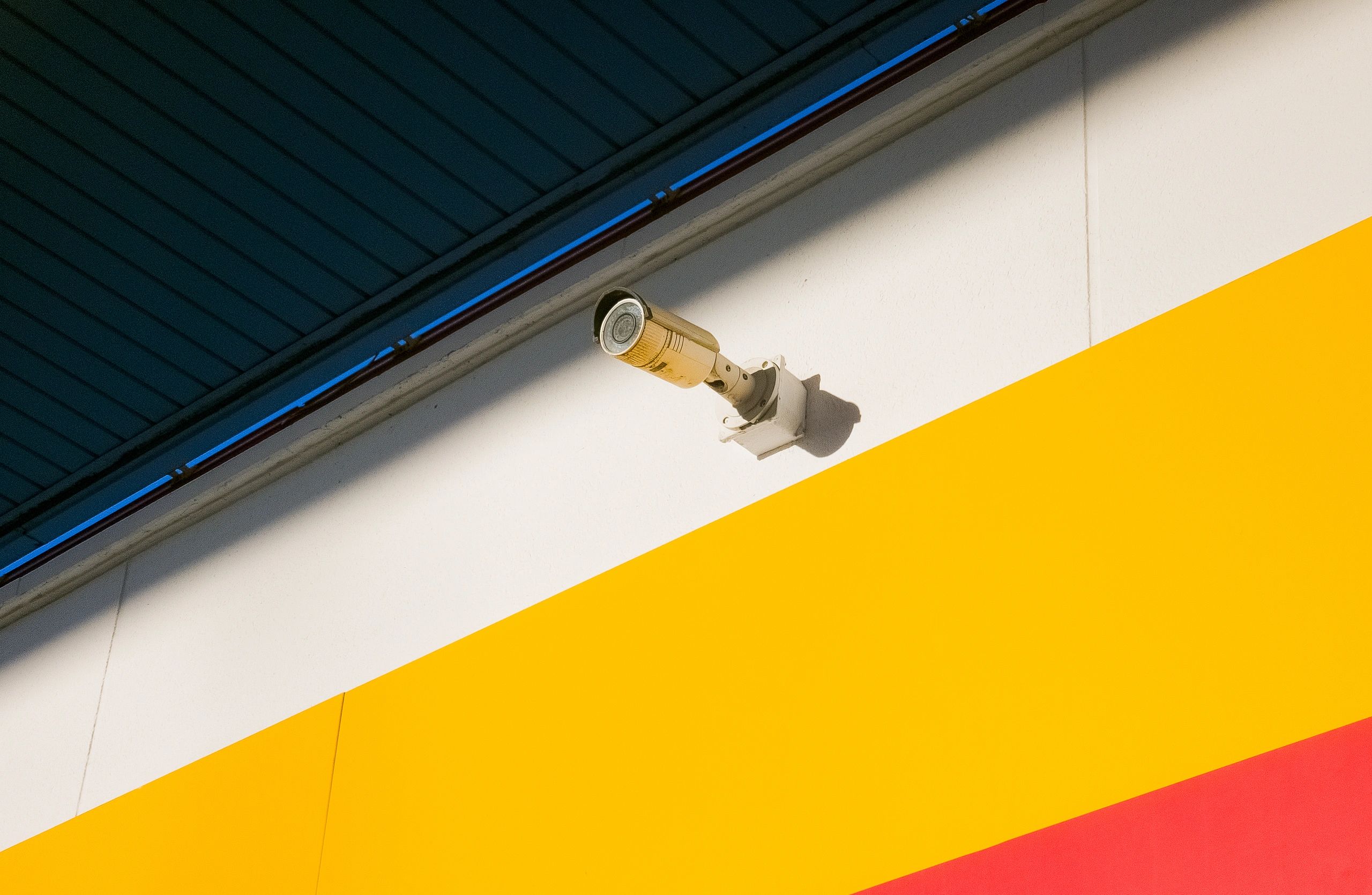 Security camera mounted on a building exterior